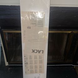 White IKEA Lack floating shelf