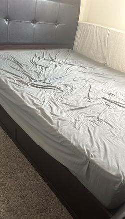 FREE: Dark Wood Bed Frame with Tufted Headboard