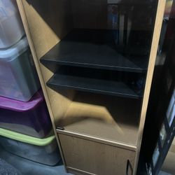 Cabinet With Two Shelves , Glass Door And Wooden Door