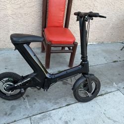 Sit Down Electric Scooter..