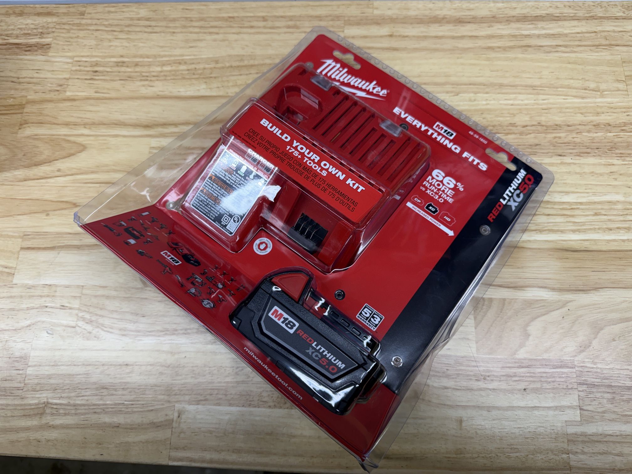 NEW - Milwaukee M18 XC 5.0 Red Lithium Battery and Charger - New in Box