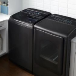 Samsung 7.4 Cu. Ft. Fingerprint Resistant Black Stainless Steel  Top Load Washer & Front Load Gas Dryer