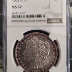 1903-O, Silver Morgan Dollar         MS62. *Toned*