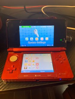 Red Nintendo 3ds + smash game