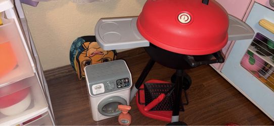 Kids play bbq and washer