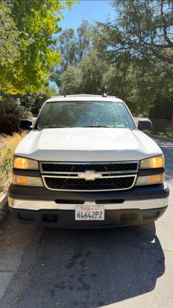 2007 Chevy Silverado, 6 cylinder, with cab over toolbox and AIr conditioner