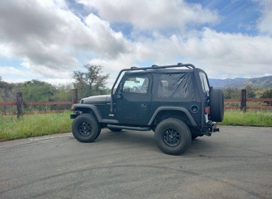 Jeep Wrangler TJ With Roof Rack Tires