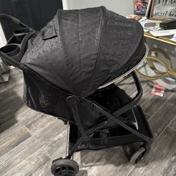 stroller with baby carrier