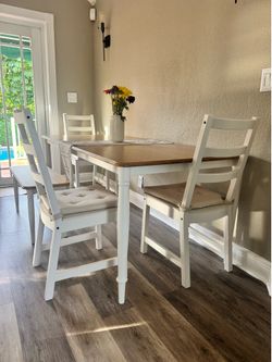 Dining table with 3 chairs and a bench
