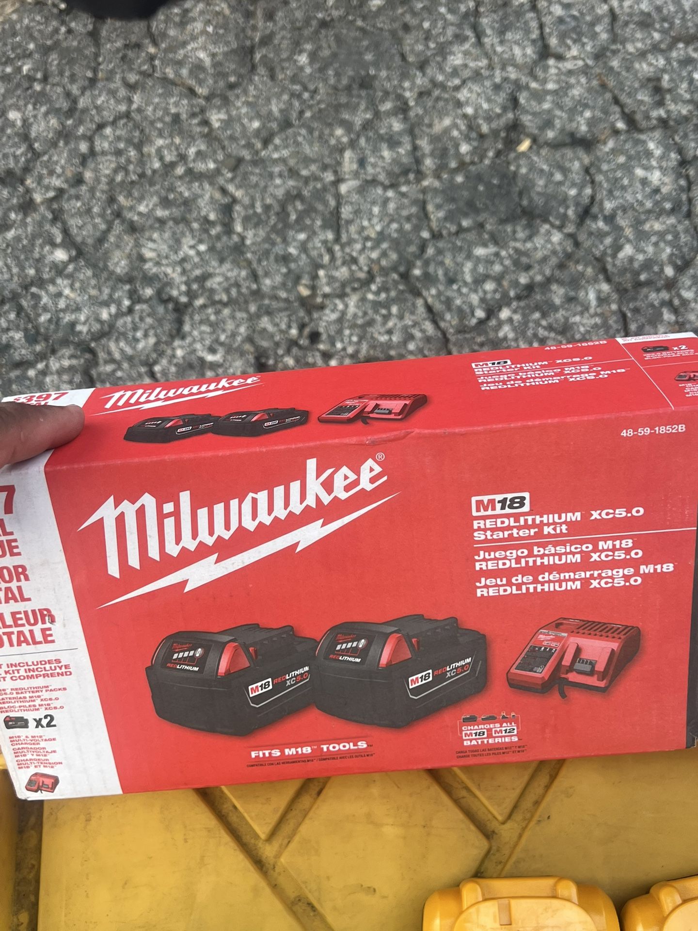 milwakee batteries 2 5.0 and charger