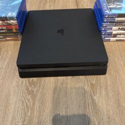 PS4 Slim + 15 Games – Great Condition!