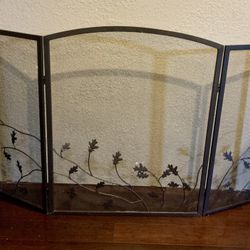 Metal Fire Place Screen With Scrolling Leaf Design Across The Front 