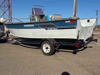 1990 Grumman 16’ Aluminum Center Console fishing boat