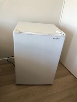 White mini fridge