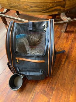 Small dog back pack with dog bowl and poop bag flash light