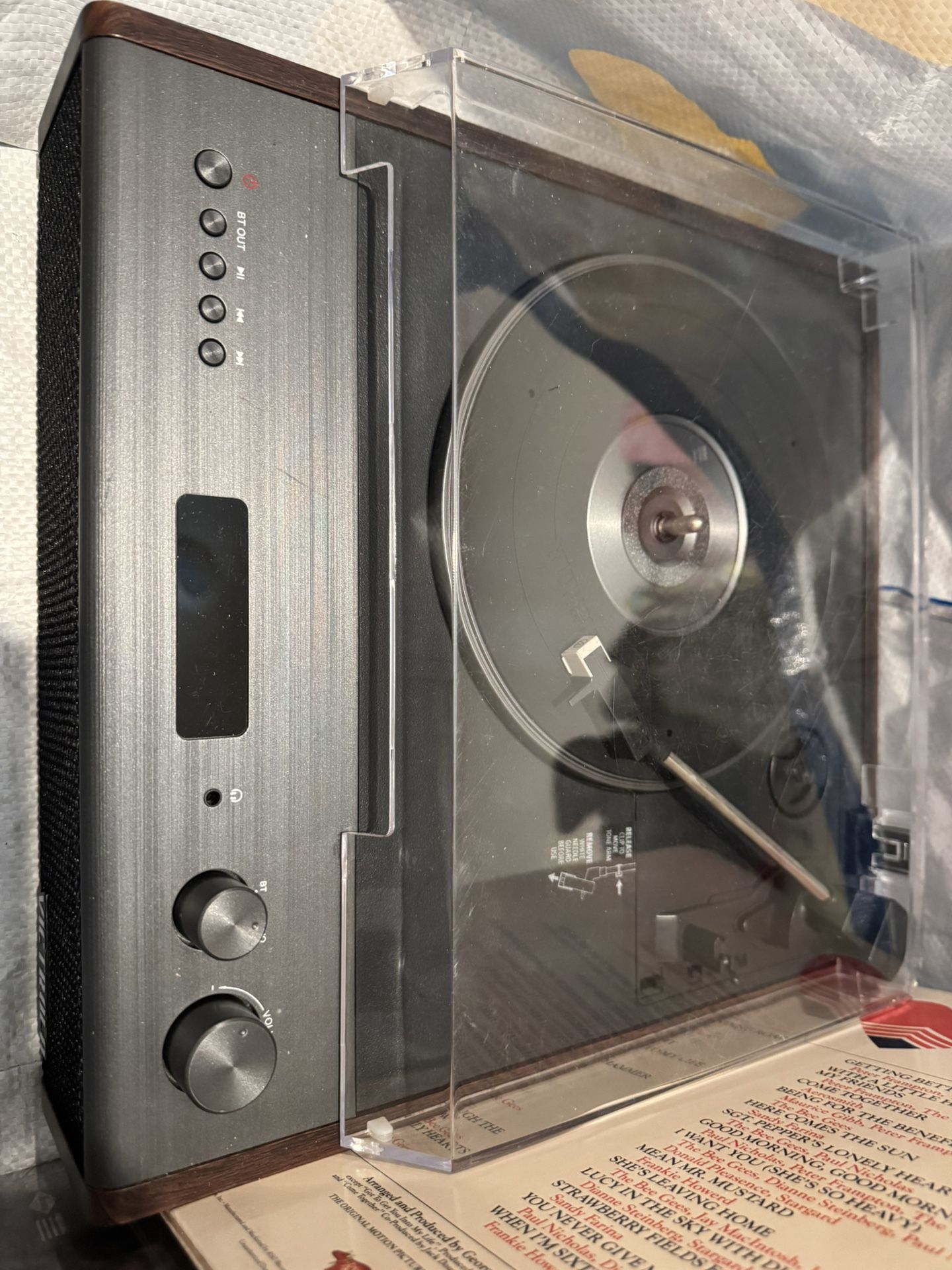 Victrola Record Player And Several Vinyl Records