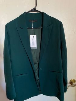 Dark green women’s blazer