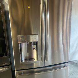 Ge French Doors Stainless Steel Refrigerator Hot Water Option!