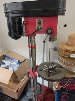 16 speed floor type drill press for parts, motor works but one of the pulleys pops out.