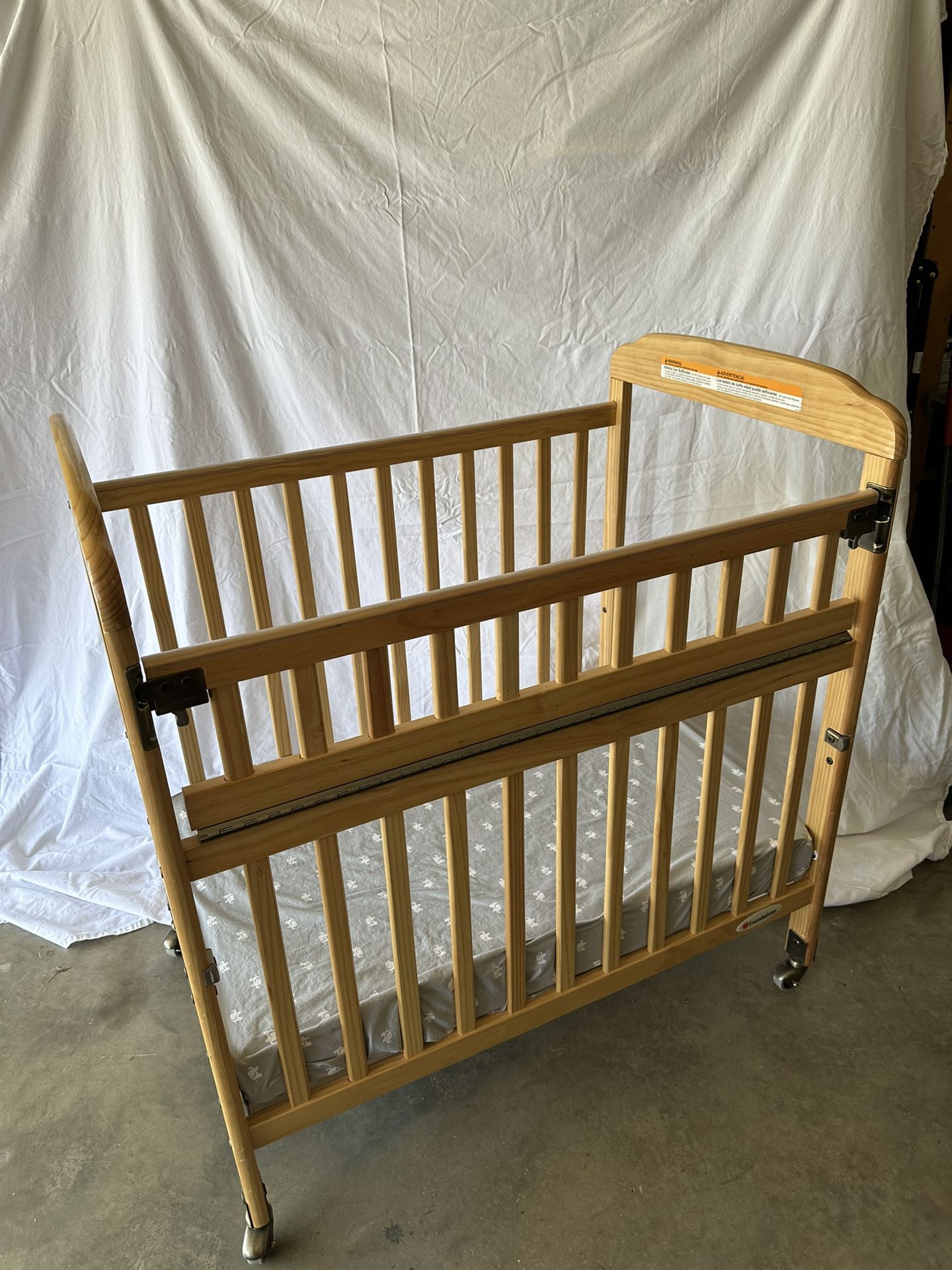 Compact Wooden Crib And Mattress