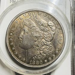 1880-S MORGAN AU NICE LUSTER AND TONING.