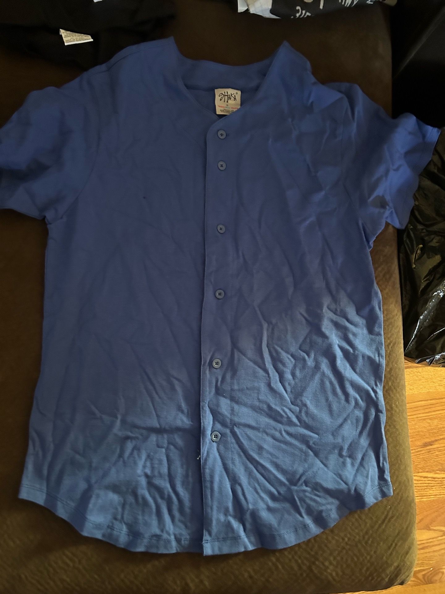 Blue buttoned shirt small