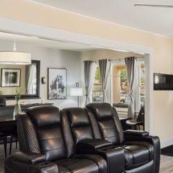 Power Reclining Black Leather Couch and Loveseat 