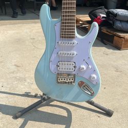 Electric Guitar Used By In Still In Good Condition 