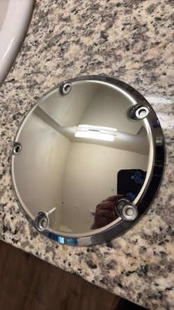 Chrome Harley softail derby cover