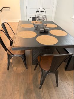 Table with chairs and bench
