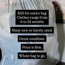 Bag of baby boy clothes
