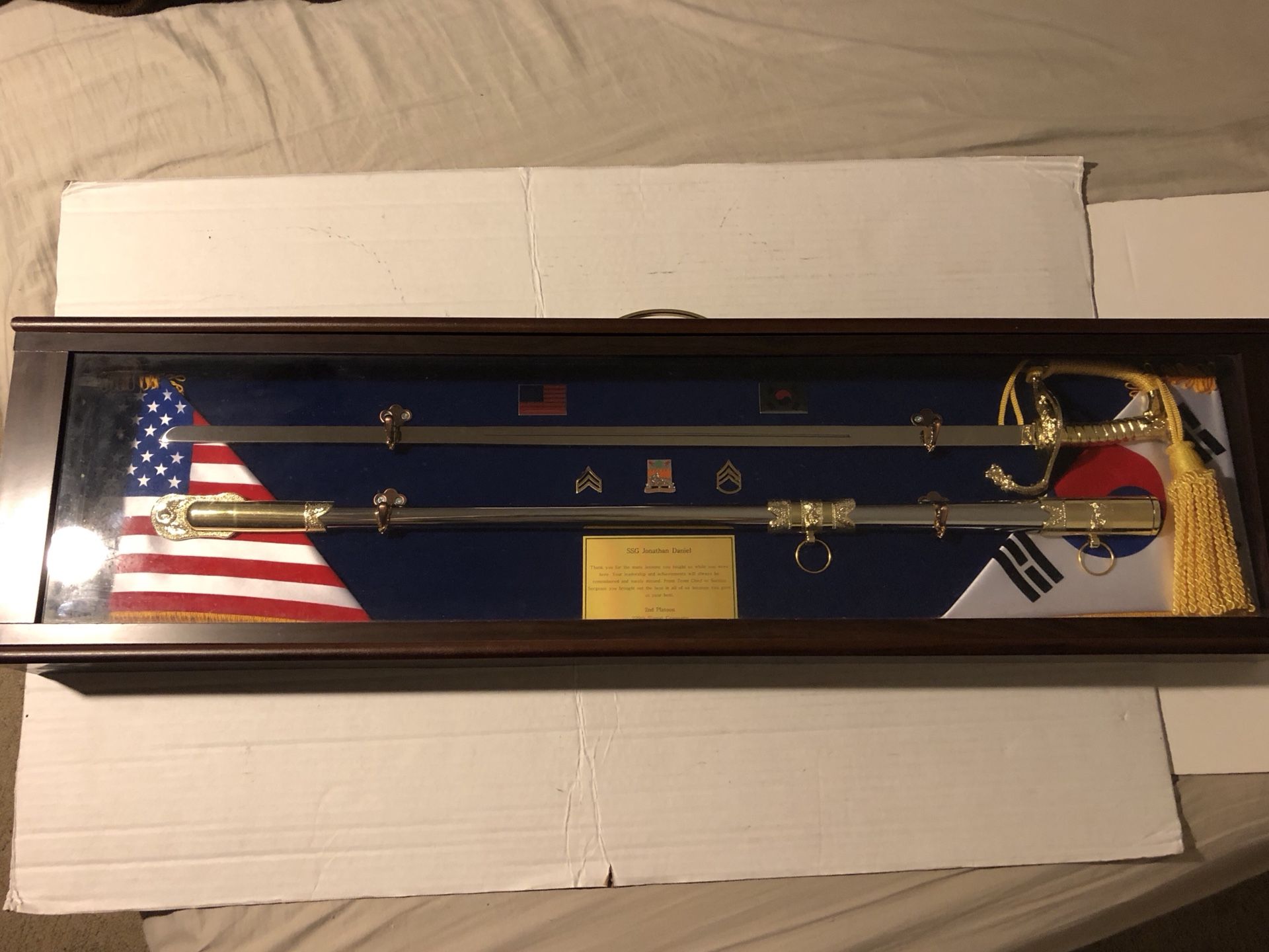 US military sword Encased in wooden and glass box from Korean War