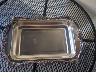 Silver serving dish, no hold.firm price. Take it or leave it.not a real silver..