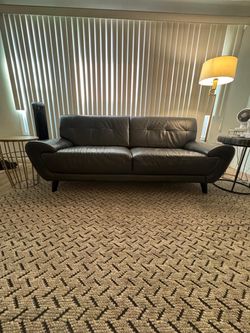 Macys dark grey leather couch