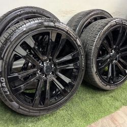 24 inch gloss black wheels with tires 6 lug gm..rims are brand new and tires are used with good tread left. Tire size 305/35r24