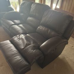 Faux leather couch with 2 reclining end seats $475