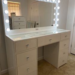 Makeup Vanity Glass top with Bluetooth Mirror / price includes delivery and assembly Three double drawers with integrated dividers in the intermediate