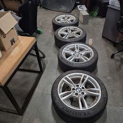4 BMW rims plus tires