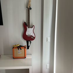 Squier Electric Guitar By Fender With Amp
