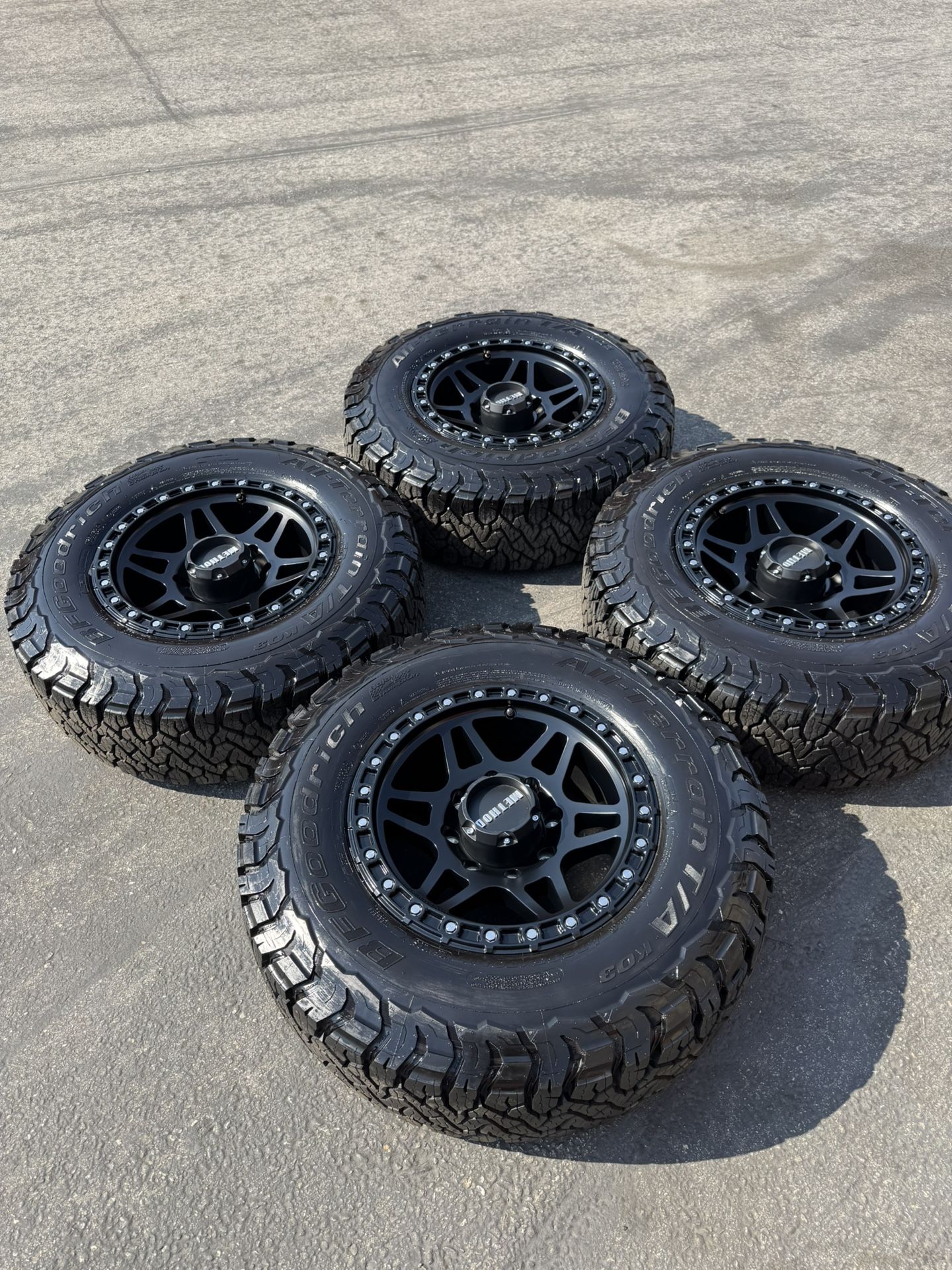 New 8x6.5 17” Method MR312 Matte Black Wheels And 32” BFGoodrich K03 All-Terrain Tires Rims