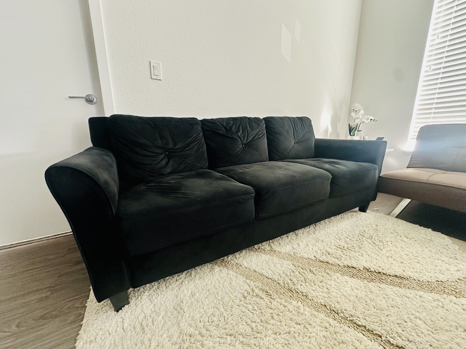 Black Sofa and Brown sofa bed (convertible futon Style)