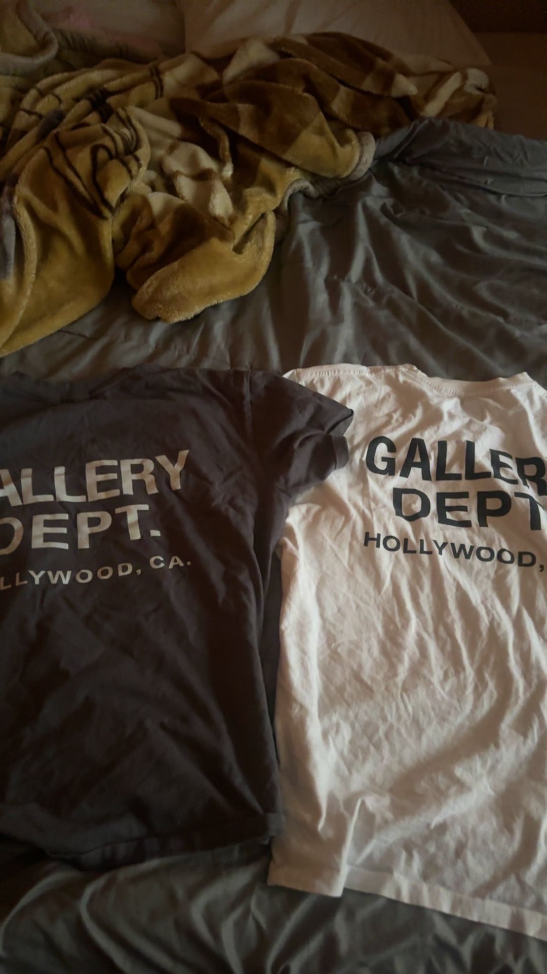 Two gallery dept shirts
