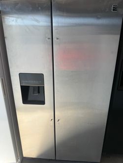 Fridge side by side have handles - ice maker working