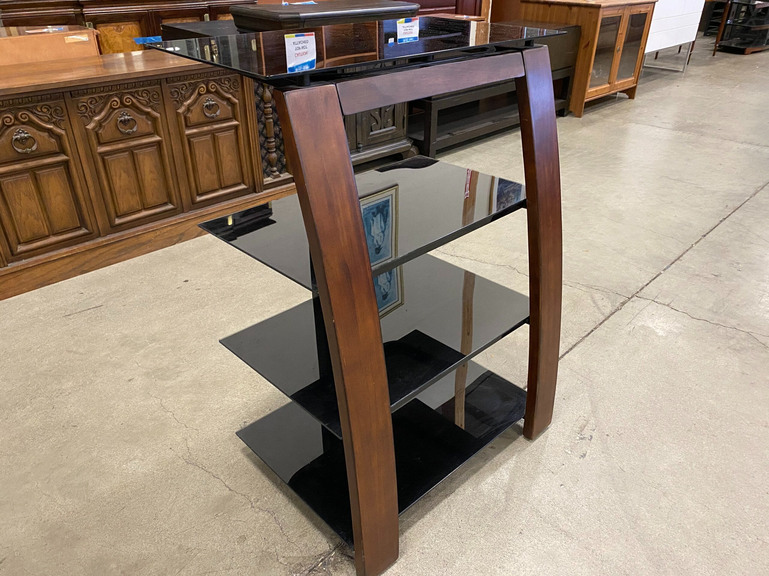 4 Tiered TV Stand with Black Glass Shelves and Curved Walnut Front