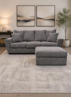 Ashley Furniture Gray Sofa & Ottoman