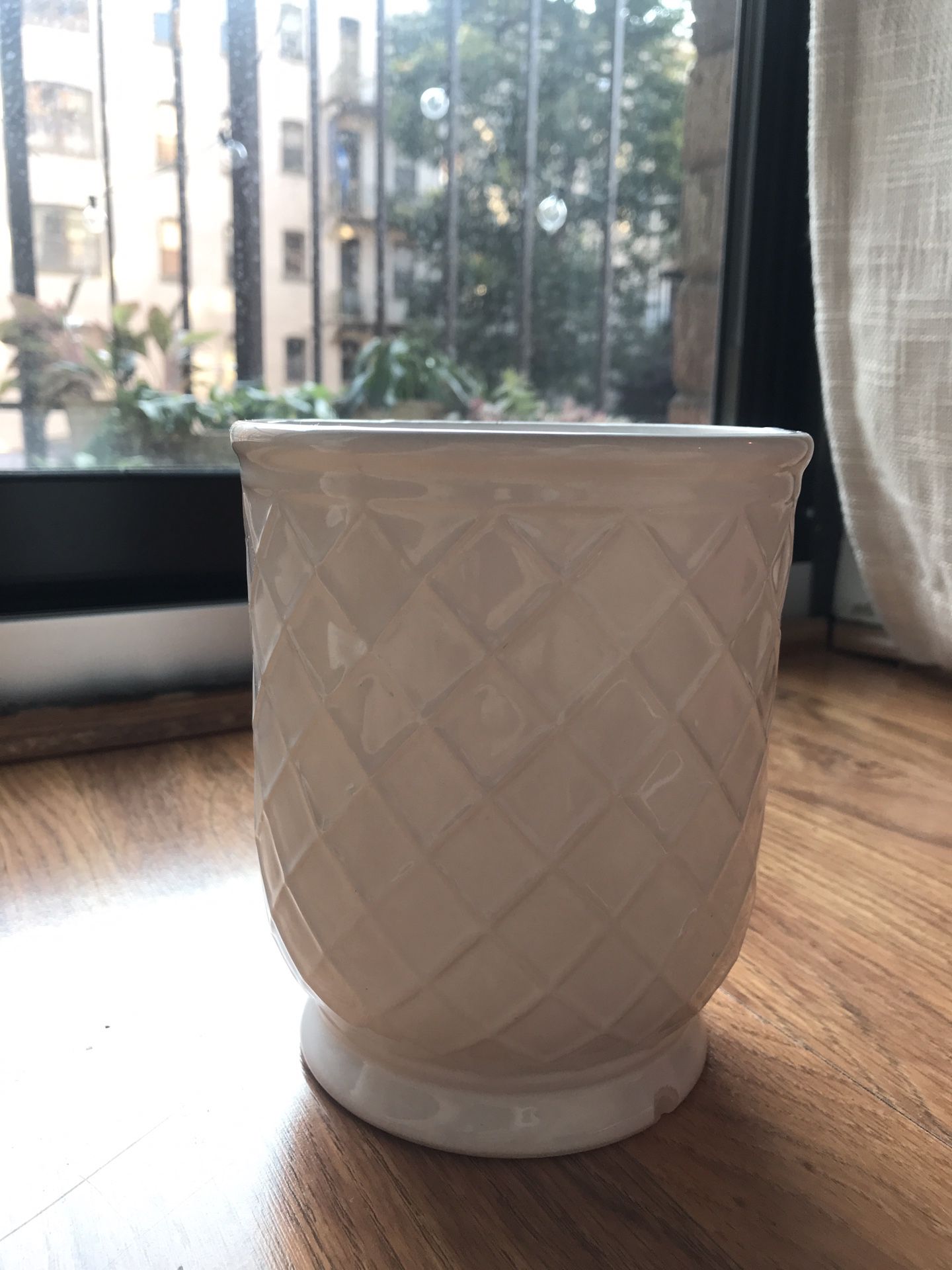 White ceramic plant pot