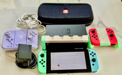 Nintendo Switch + HORI Split Pad + Extra Joy-Cons + Travel Case