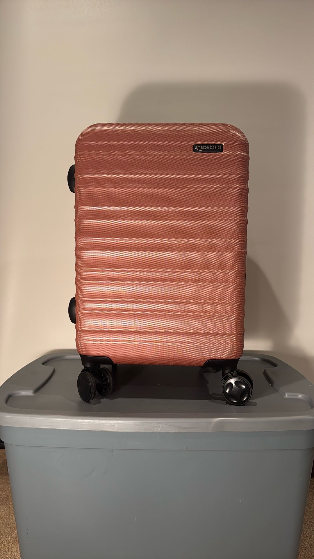 Amazon basics hard shell rollable suitcase 