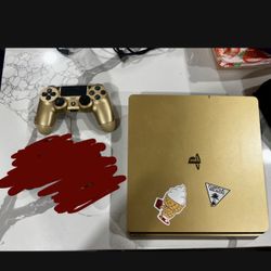 Gold PS4 Slim , Comes With A Controller.