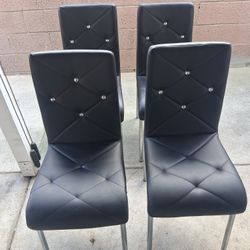 4 Black And Diamond Chairs